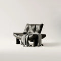 Fauteuil d'appoint contemporain en chenille noire capitonnée sans accoudoirs